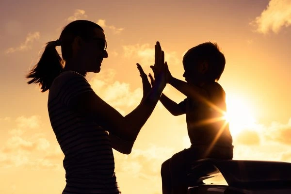 Image of happy mother and child after resolving child arrangements Worcestershire